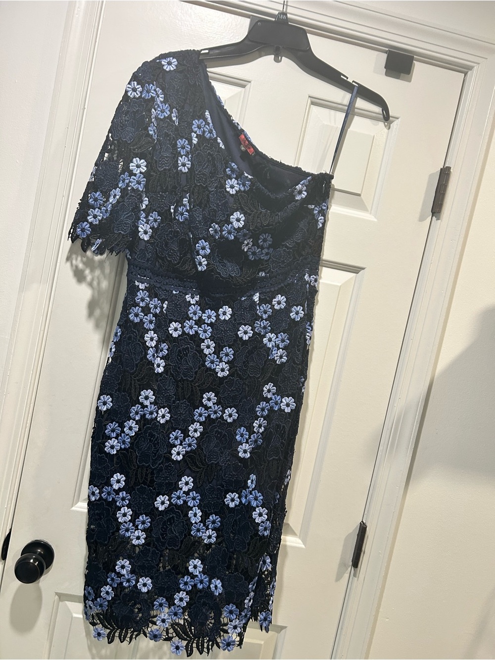 Off shoulder navy blue dress.